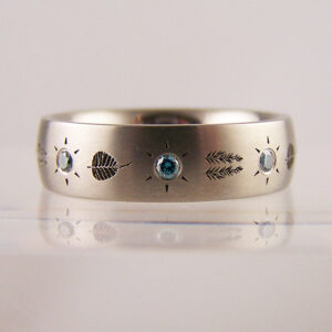 Bodhi Willow and Nova laser engraved ring
