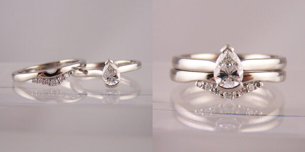 pear cut engagement ring with fitted tiara wedding ring
