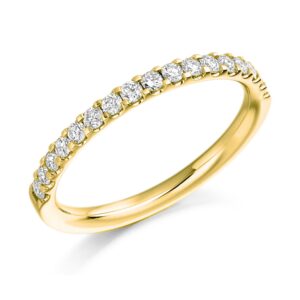 Claw set Diamond wedding ring in yellow gold