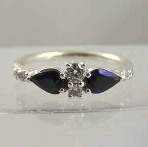 5 row ring reset into a sapphire & Diamond ring AFTER