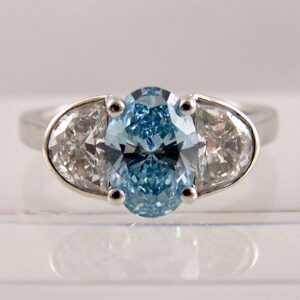 Fancy blue Diamond with crescent shoulders