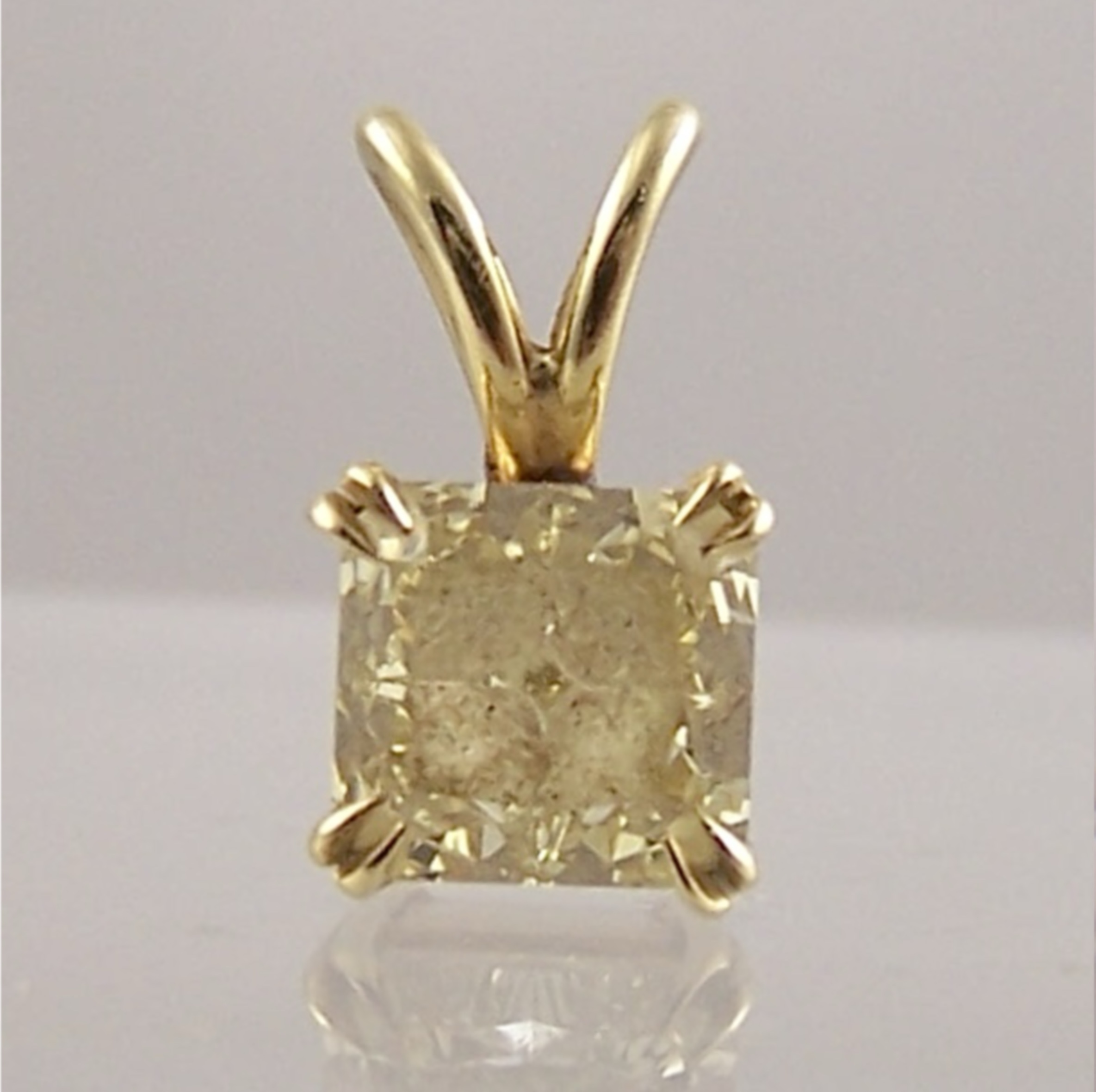 Yellow Diamond pendant reset into a halo ring BEFORE