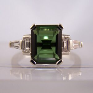Tourmaline ring with baguette cut shoulders